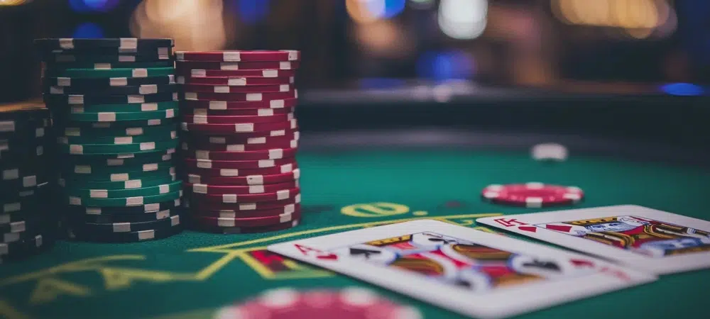 poker chips and cards on a poker table