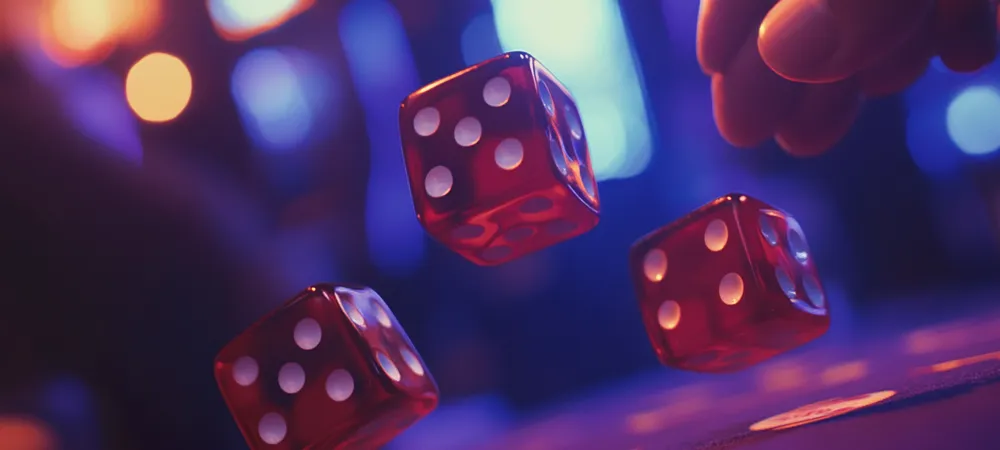 a person throwing dice on a poker table